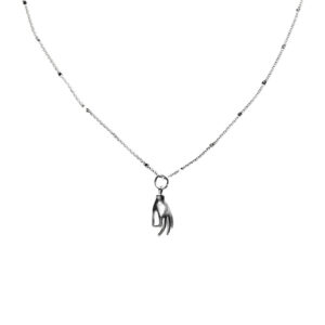 The hands on necklace