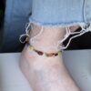 Enkelarmband met een mix aan edelsteenkralen in veel verschillende kleuren. Met de naam Summer