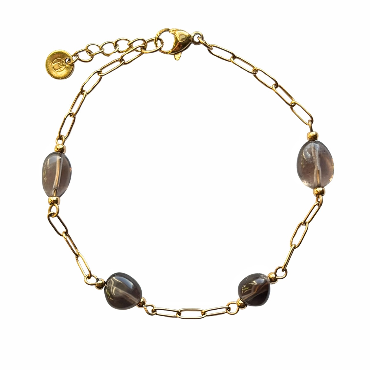 Gouden grove schakelarmband met rookkwarts kralen.